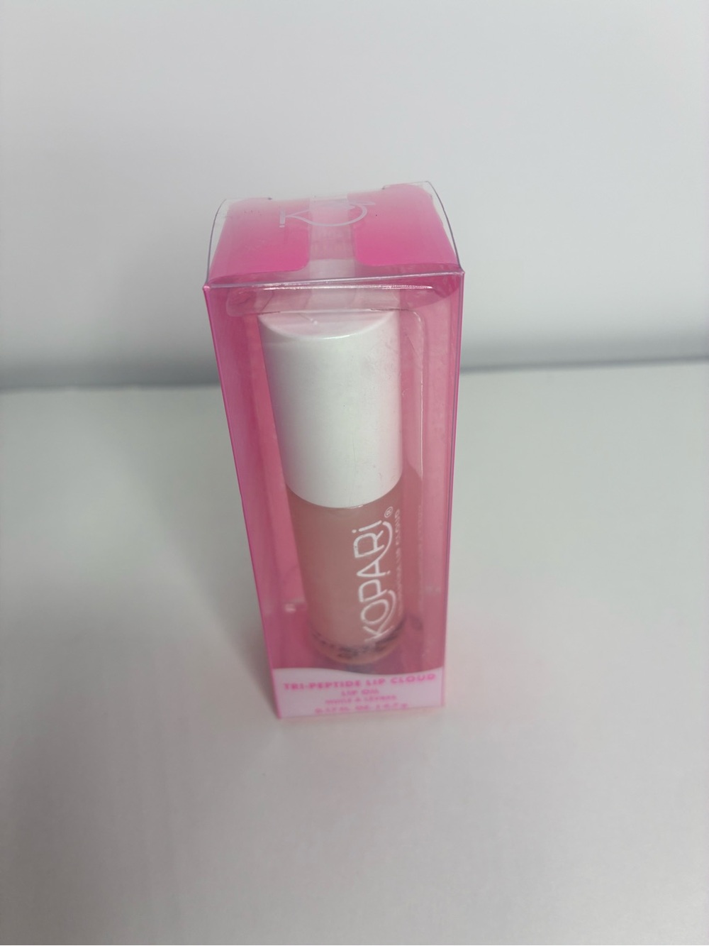 Kopari Nude Pink Lip Oil Gloss with White Cap
